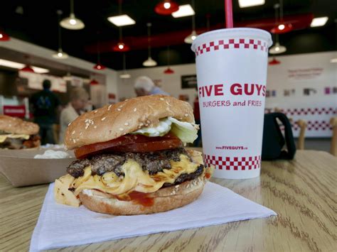 who founded 5 guys burgers.